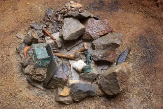 Remnants of belongings from an ancient Roman cult site, Nida, uncovered during archaeological excavations.