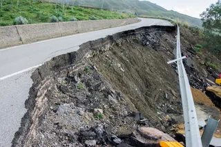 road destroyed by landslide 