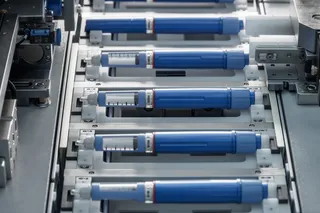 medicine pen injectors in a factory 