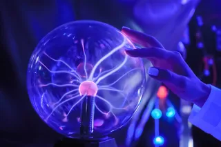 Person touching ball of static electricity