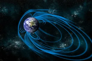 Depiction of Earth’s magnetic field lines surrounding the planet.