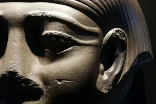 close up of an Egyptian face statue 
