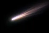 a colorful comet in space 