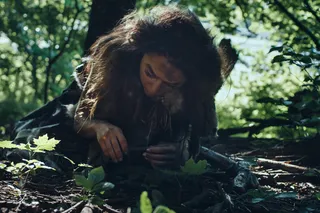a neolithic woman gathering food 