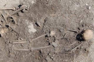Skeletal remains found at a stone age gravesite.