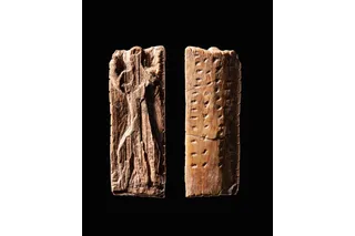 wood and ivory carved piece with possible early language 