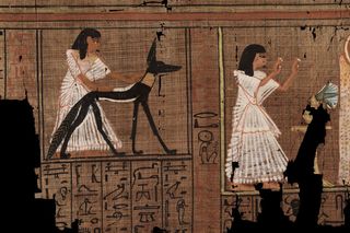 Ancient Egyptian illustration of a person and a jackal that has wite-out on it's belly