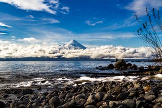 Snow-capped volcano near Monte Verde, Chile. 