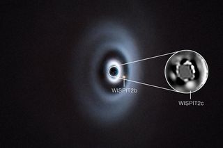VLT images of two planets forming around a young star
