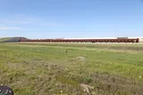 Texas A&M Detonation Research Test Facility showing a nearly 500-foot-long detonation tube with thick steel walls and an earth-covered muffler