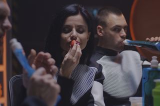 Astronauts eating and drinking on a long mission