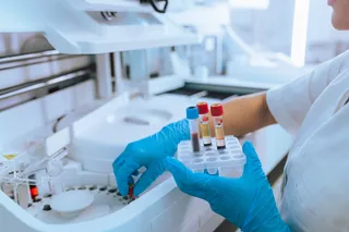 Researcher analyzes blood samples