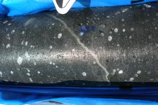 Basalt core with mineral-filled vesicles studied by researchers investigating how ancient humans selected stone for tools.