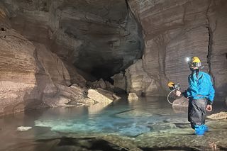 person in underwater cave system in the Grand Canyon