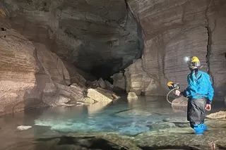 person in underwater cave system in the Grand Canyon