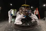 Engineers attaching LINK to a simulator at NASA