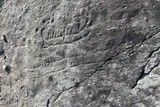 Viking ship carved into a cliff 