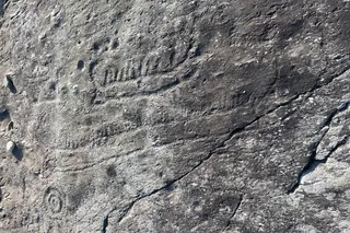 Viking ship carved into a cliff 