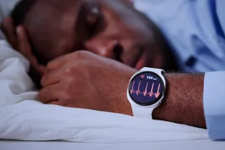 man wearing a sleep monitoring on his wrist