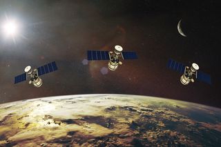 three satellites in low Earth orbit 