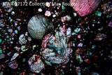 Hectic Mini-Moon Collisions in the Early Solar System Produced the Grains Packed Inside Meteorites