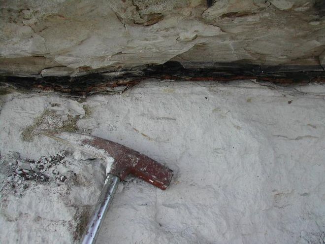 ancient clay layer with hammer ancient clay layer with hammer