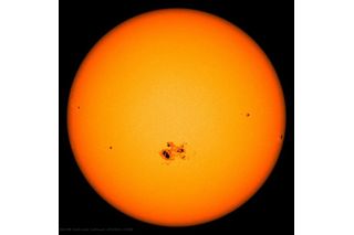 dark sunspots on the surface of the sun 