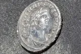Silver roman coin with Roman Emperor Carausius face on it