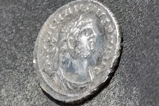 Silver roman coin with Roman Emperor Carausius face on it