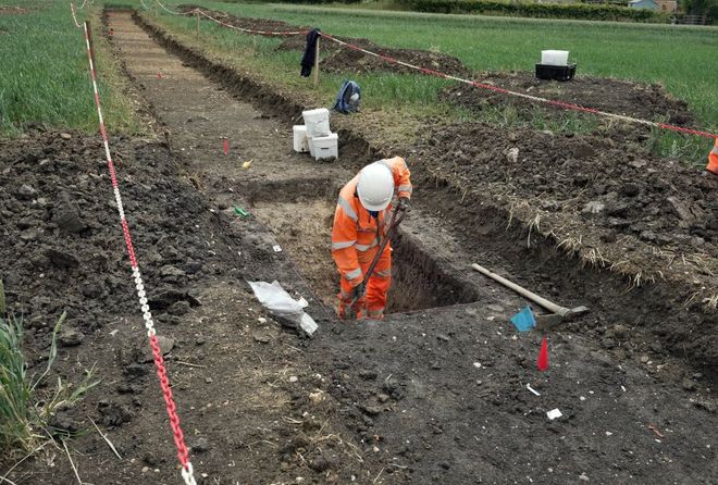 workers excavating a trench workers excavating a trench