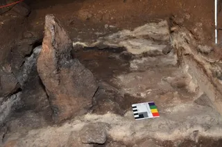 ash covered rock in ancient cave