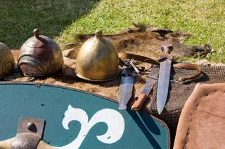 Ancient sword, shield, and helm replicas 