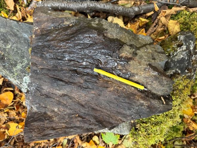 A shatter cone found at Quebec’s 390-million-year-old Uhackatik meteorite impact crater, with a pencil for scale. A shatter cone found at Quebec’s 390-million-year-old Uhackatik meteorite impact crater, with a pencil for scale.
