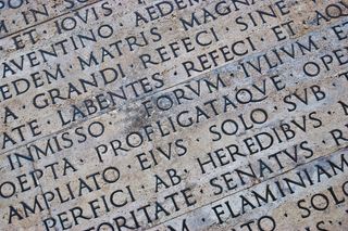 Ancient writing carved into stone 