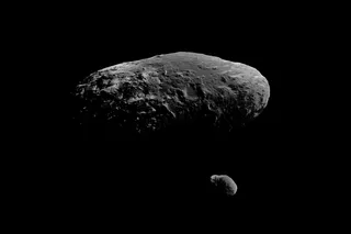 asteroid with a smaller satellite in space