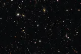 image of star and other celestial bodies with supernova SN 2026gzf in the  middle