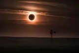 Solar Eclipse over a farm 