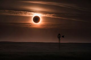 Solar Eclipse over a farm 