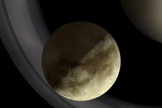 the moon Titian by one of Saturn's rings