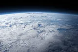 cloudy surface of earth from space
