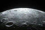 View of the moon in space, referencing microbes that could survive on lunar surface