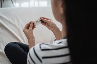 Woman pulls out hair, could be trichotillomania