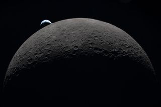 View of the moon from space, with Earth in the background, from the Artemis II mission