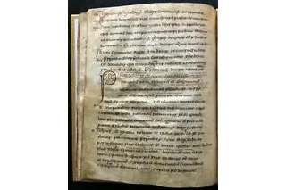An open page from an eighth-century parchment manuscript of St. Paul’s Epistles that researchers examined for ancient sheeppox virus DNA.