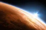 Mars atmosphere with the sun in the distance 