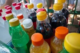 assortment of sugar drinks in bottles 