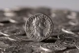 Roman silver coin standing out among others 