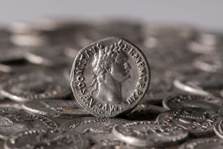 Roman silver coin standing out among others