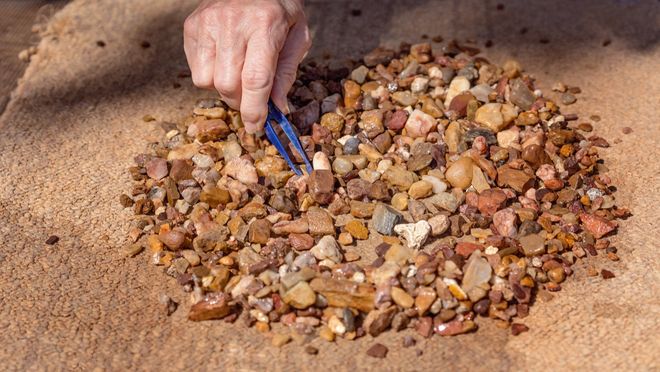 looking for gems in a a pile of stones looking for gems in a a pile of stones