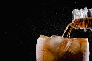 Diet soda poured into a glass